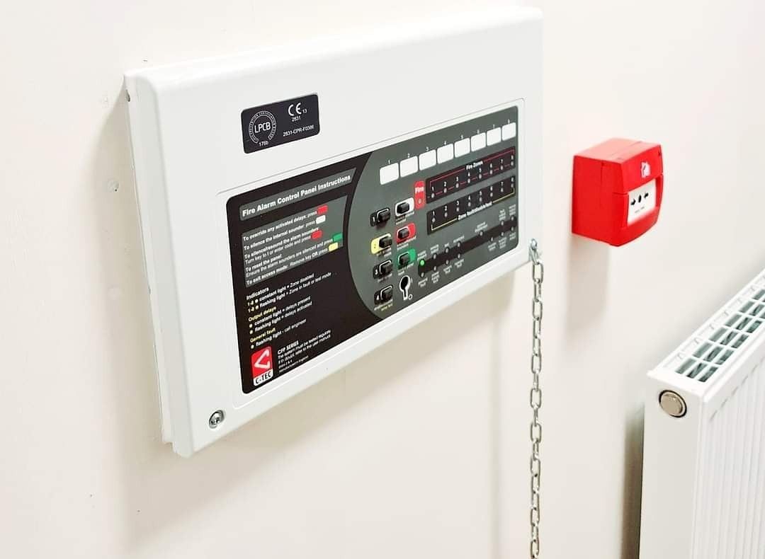 Fire alarm control panel and call point installed in an HMO
