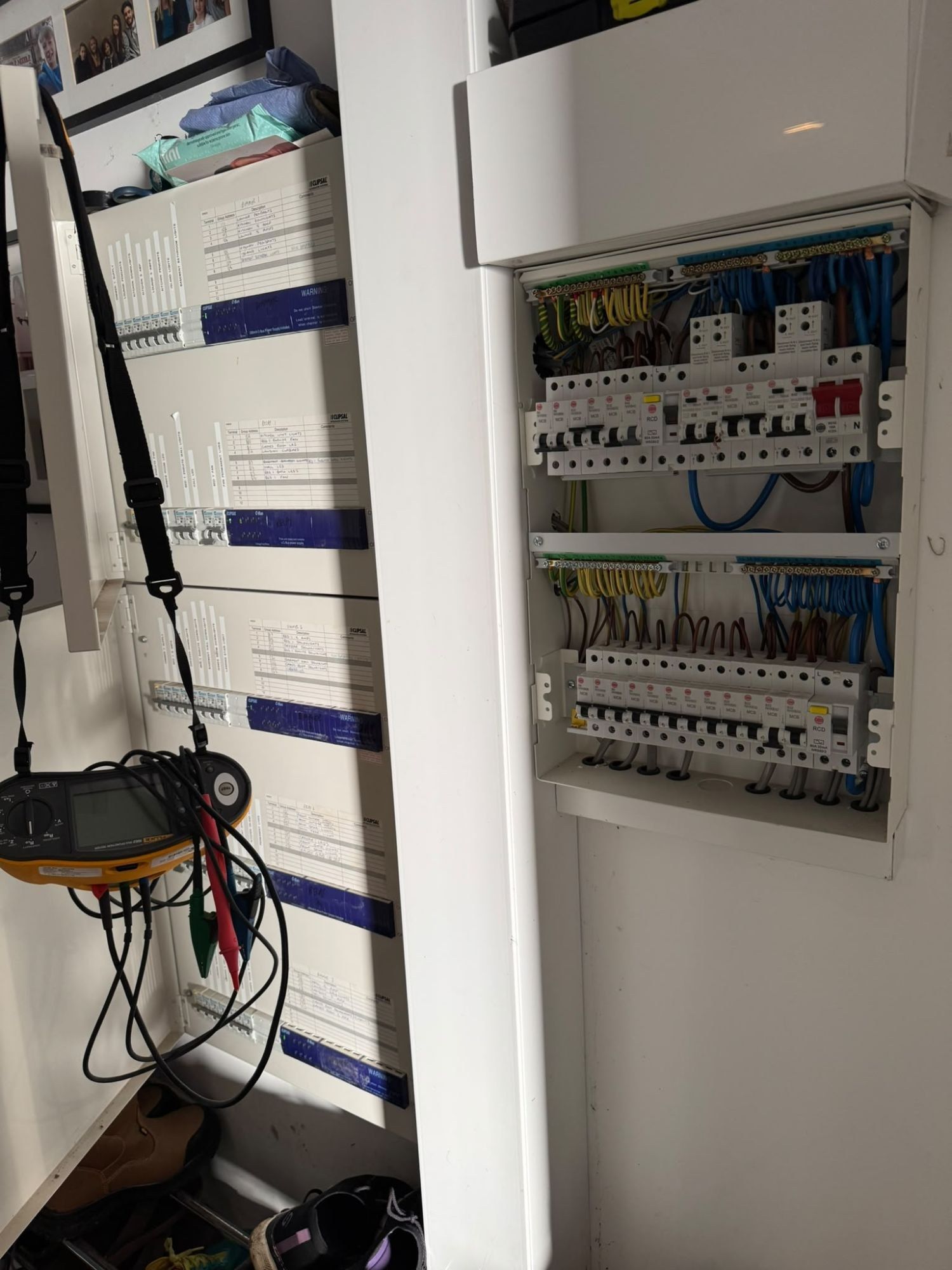 Multifunction tester on a set of distribution boards during fault finding